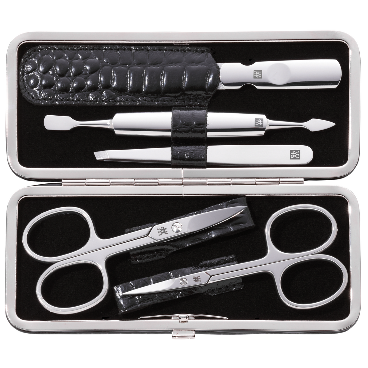 Geöffnetes ZWILLING Classic Set 5tlg. in schwarzer Kroko-Optik und Metallrahmen, mit den meistgenutzten Pflegeinstrumenten aus rostfreiem Edelstahl.